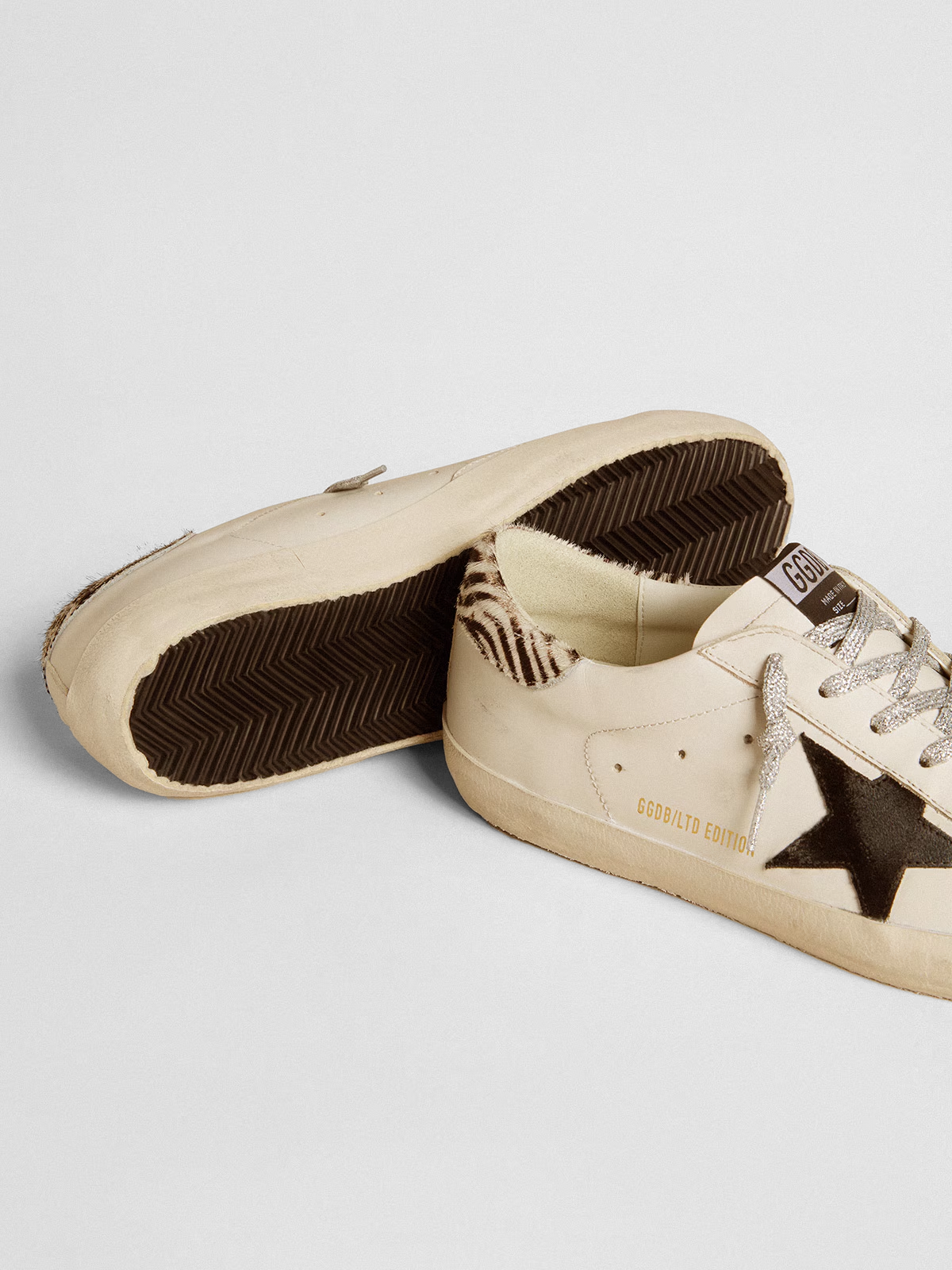 Super-Star LTD with suede star and pony skin heel tab